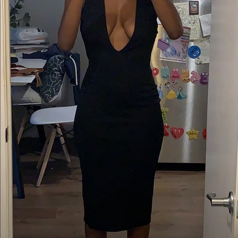 Low cut black body con dress